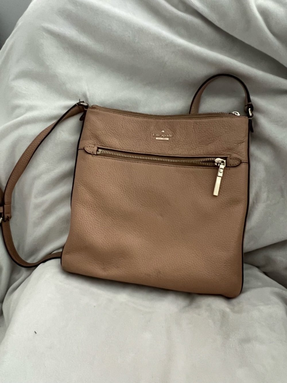 kate spade tan crossbody bag with front zip and gold hardware